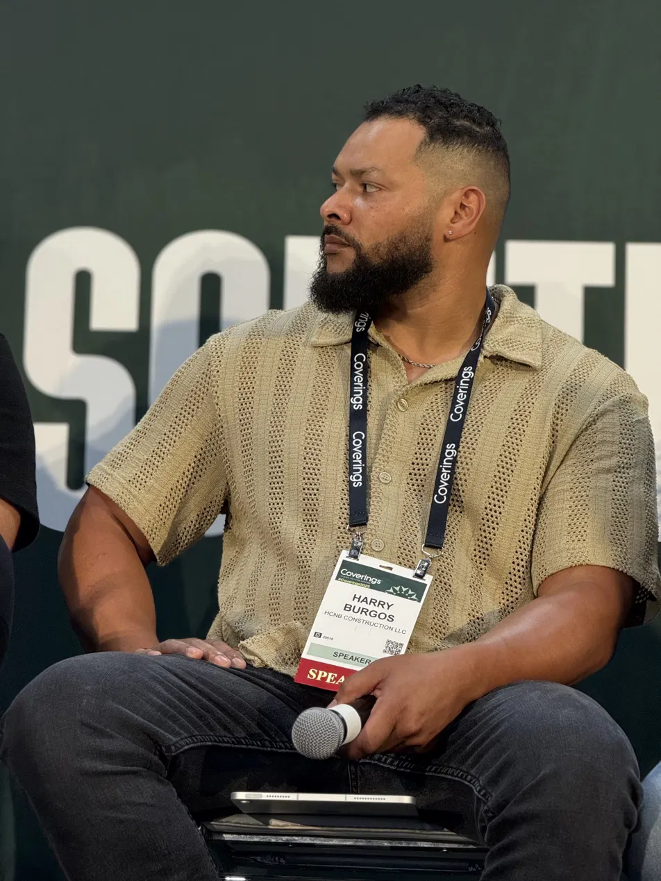 Harry Burgos, Owner of CNB Renovations, speaking at Coverings trade show